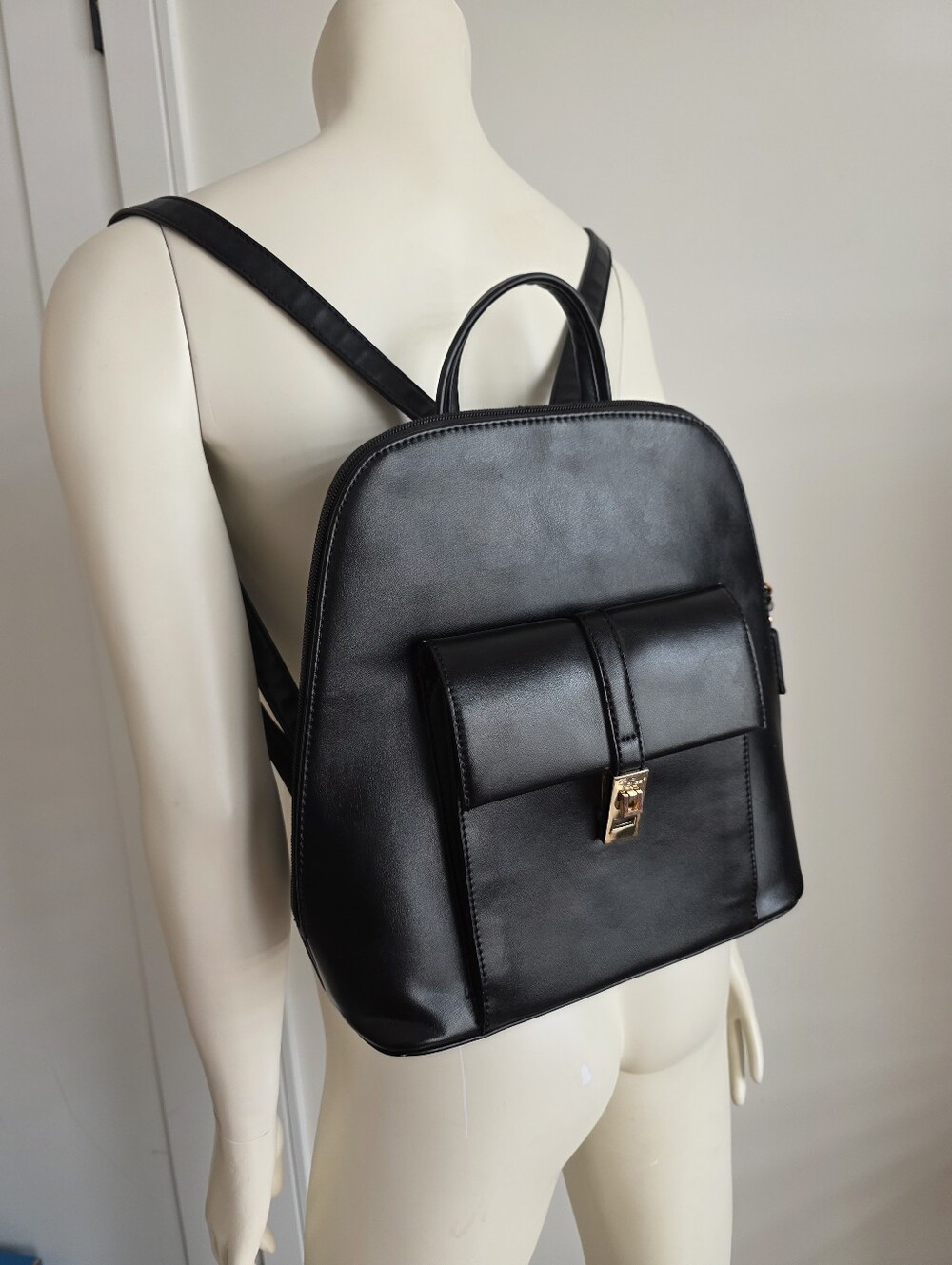 David Jones Sleek Black Faux Leather Hard Shell Backpack with Front Lock Pocket